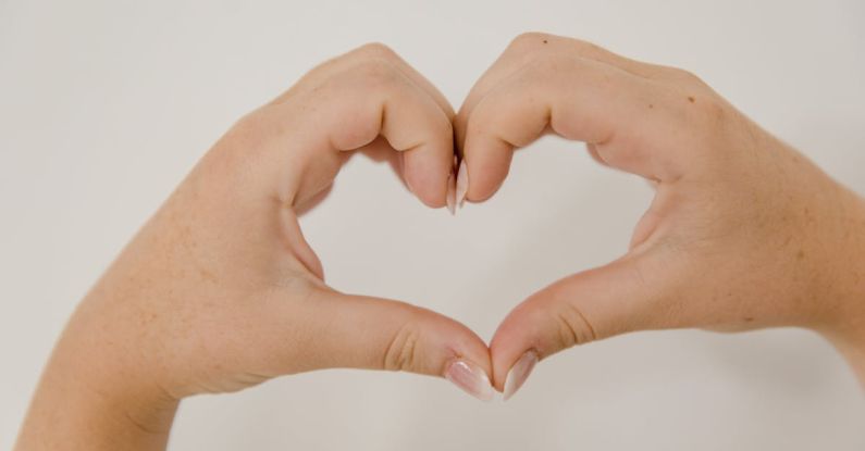 5 Love Languages - Hands Showing Heart Sign