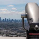 La La Land - A binoculars looking out over a city
