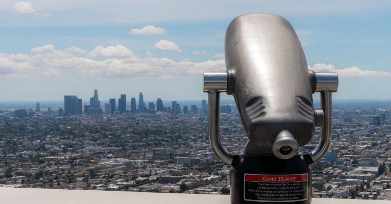 La La Land - A binoculars looking out over a city