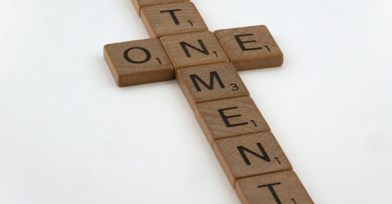 Shawshank Redemption - A cross made out of scrabble letters that says atonement