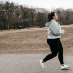 Born To Run - Plus size woman running in autumn park