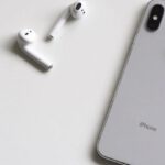 IPhone - Silver Iphone X With Airpods