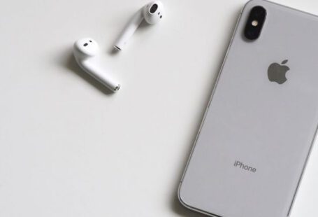 IPhone - Silver Iphone X With Airpods