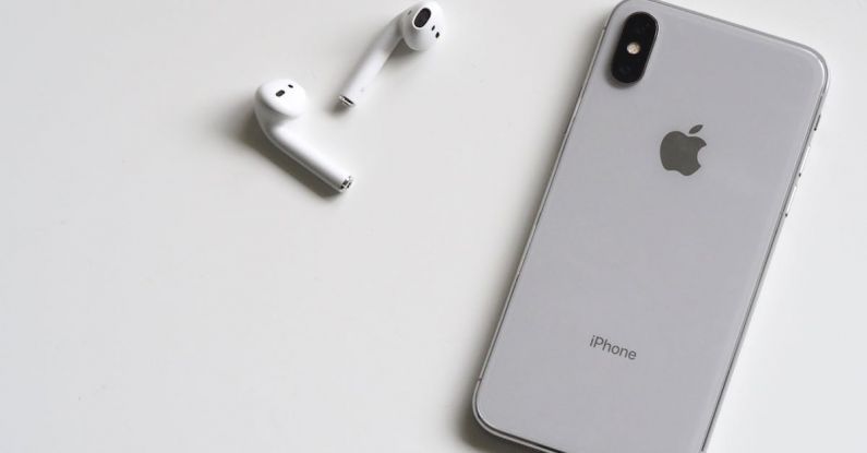 IPhone - Silver Iphone X With Airpods