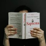 Sapiens - A Person Reading a Book