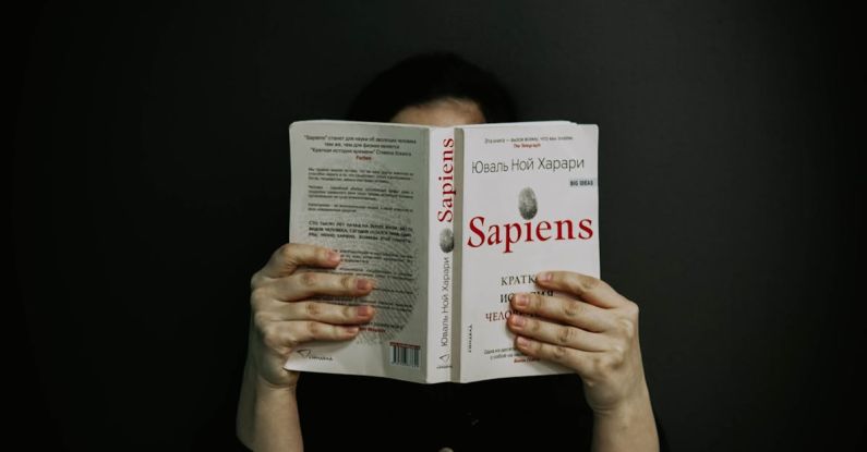 Sapiens - A Person Reading a Book