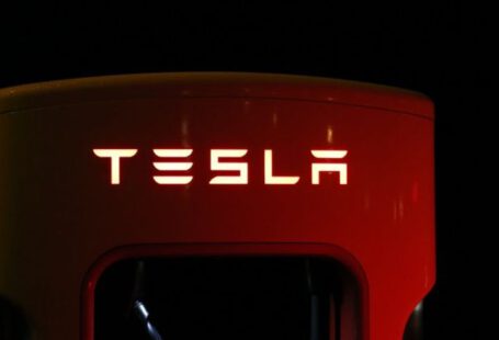 Tesla - Close-up of Illuminated Text Against Black Background
