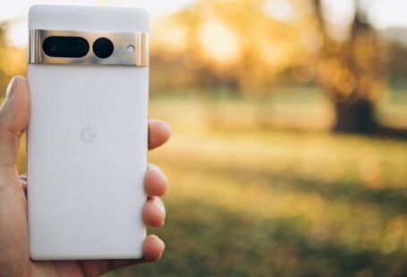 Google Pixel - Close-up of a Person Holding a Google Pixel Smartphone