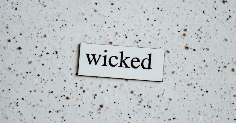 Wicked - Text on a White Surface
