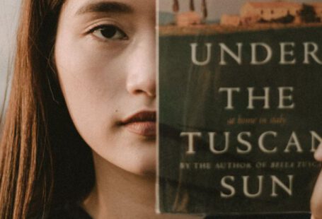 Under The Tuscan Sun - Woman Holding Under the Tuscan Sun Book