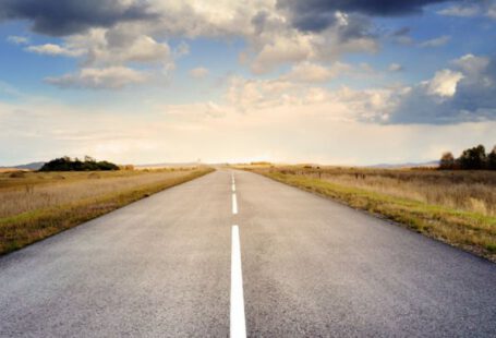 On The Road - Asphalt Road Under Cloudy Sky